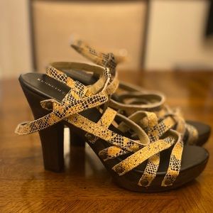 Yellow leg strap open toe shoe